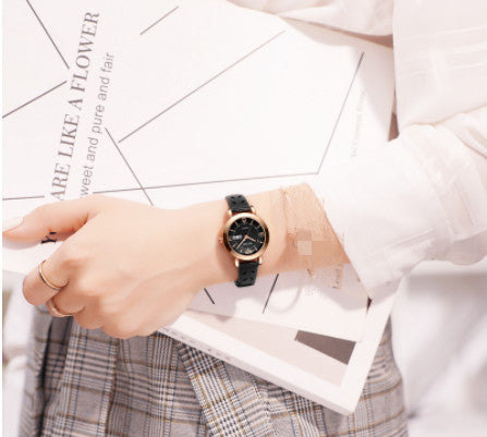 Montre femme en alliage à quartz avec double calendrier, étanche et lumière nocturne