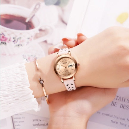 Montre femme en alliage à quartz avec double calendrier, étanche et lumière nocturne